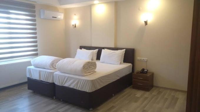 Ikarus Hotel คูซาดาซี ภายนอก รูปภาพ